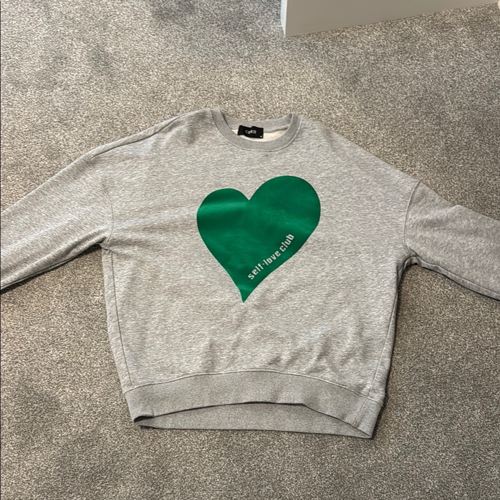 Gray Sweatshirt with Green Heart Design